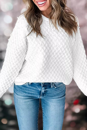 52% viscose, 26% polyester, 22% polyamide Care instructions: Machine wash cold pullover sweater in ivory with relaxed