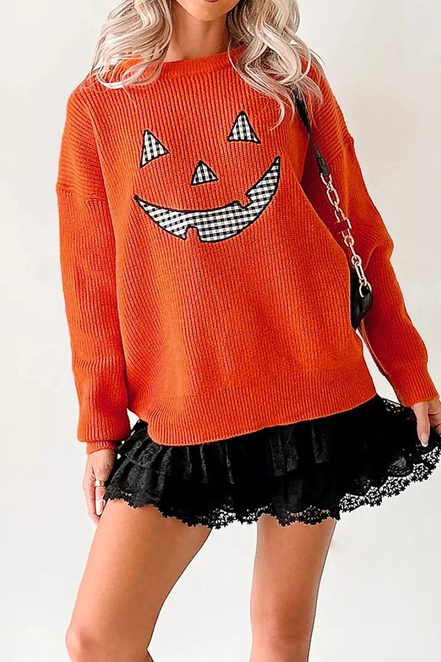 52% viscose, 26% polyester, 22% polyamide Care instructions: Machine wash cold pullover sweater in orange with relaxed