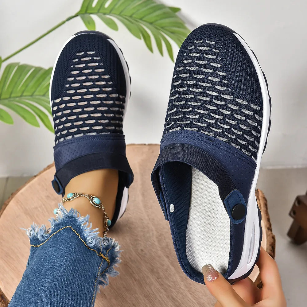 Dark Navy breathable knit sport clogs with white soles and a heel strap.