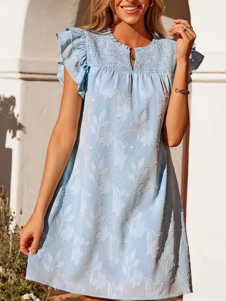 Sky blue floral embossed mini dress with smocked bodice and ruffled sleeves.