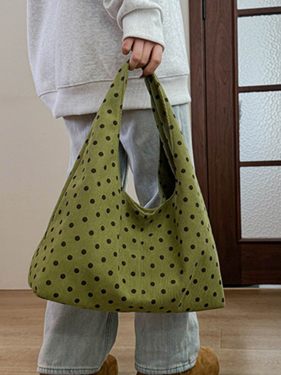 handbag in dark brown with polka dot and polka-dot print