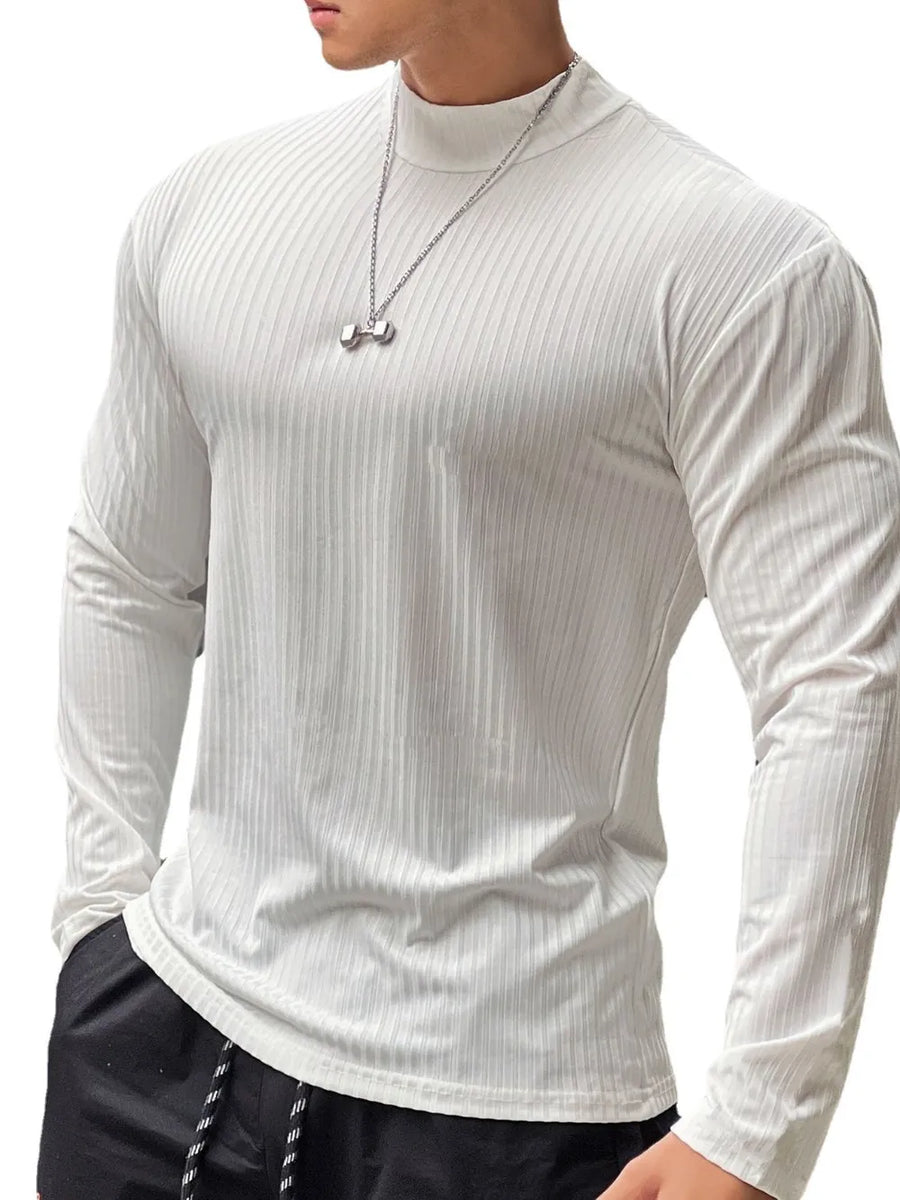 White ribbed mock neck muscle fit long sleeve shirt with a dumbbell pendant necklace.