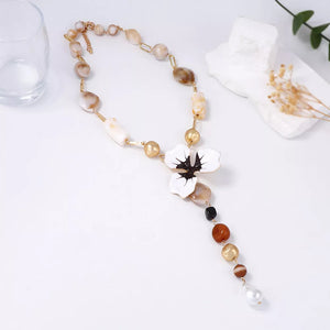 18K Gold-Plated, Resin, Zinc alloy Care instructions: Imported Size &amp necklace in brown with Y-shaped silhouette