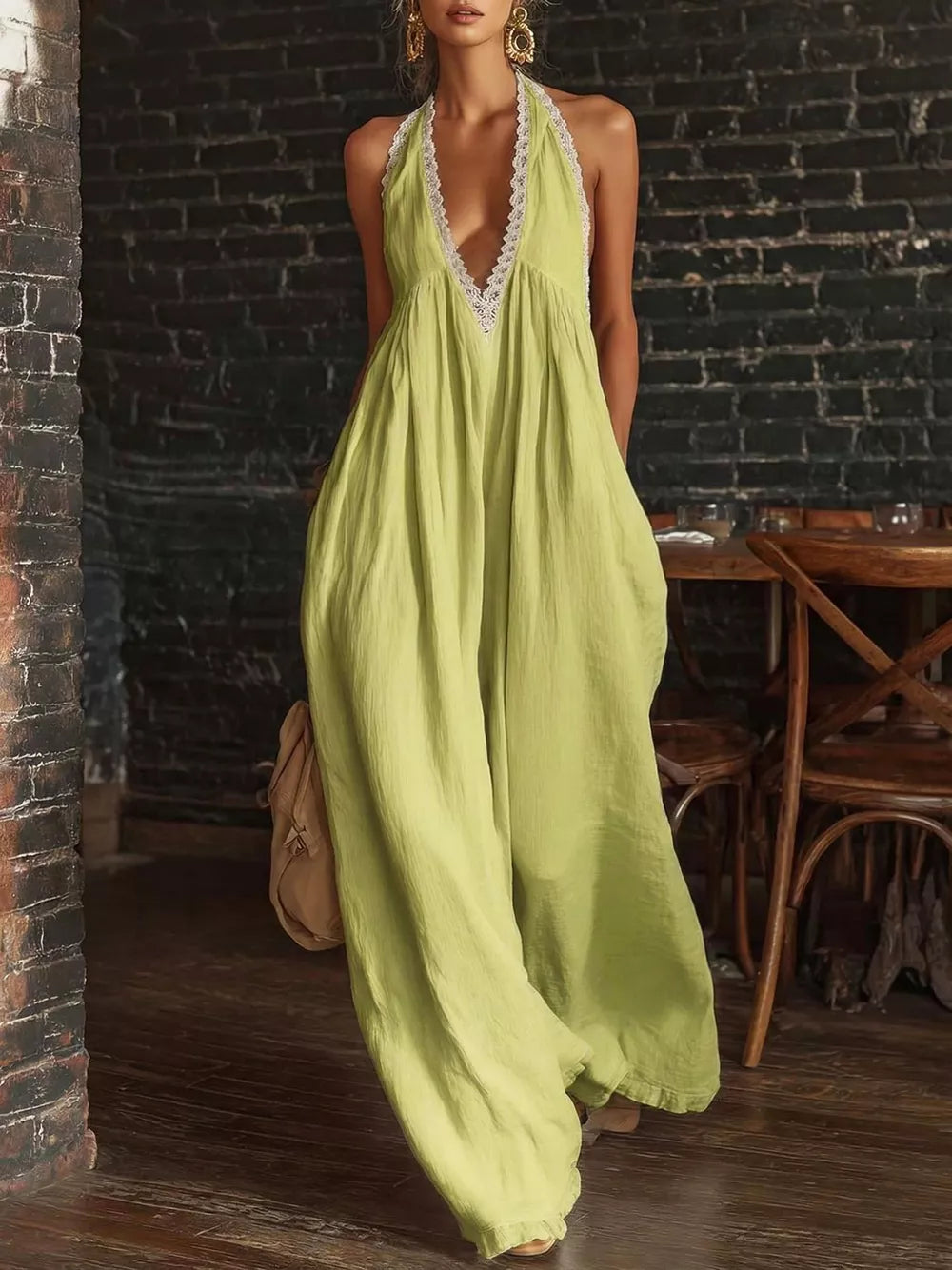 Lime green linen blend maxi dress with white lace trim halter neckline and wide legs.