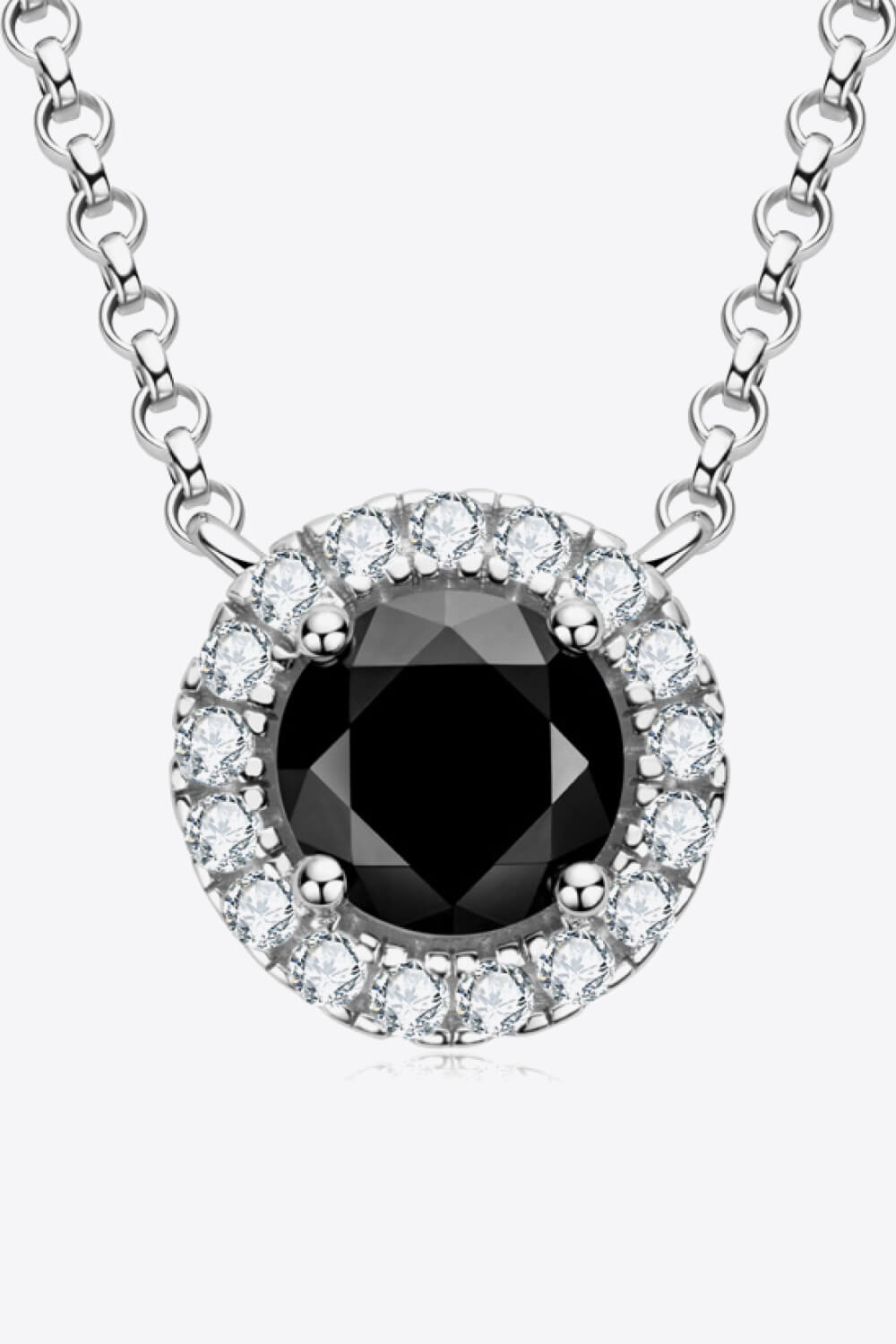 Black Halo Moissanite necklace with a round black center stone surrounded by clear accent stones on a silver chain.