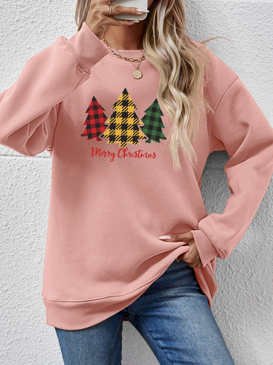 Blush Pink crewneck sweatshirt with plaid Christmas trees graphic and Merry Christmas text.
