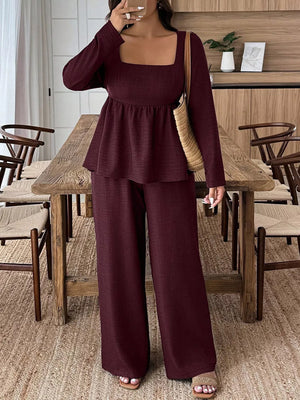 Wine red ruched two-piece set with square neck top and wide leg pants.