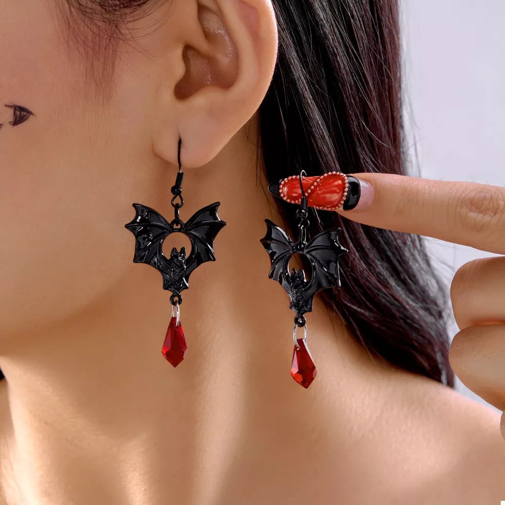 earrings in black featuring bat motif and straight fit