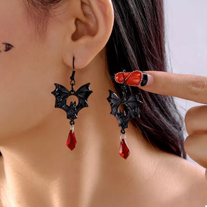 earrings in black featuring bat motif and straight fit