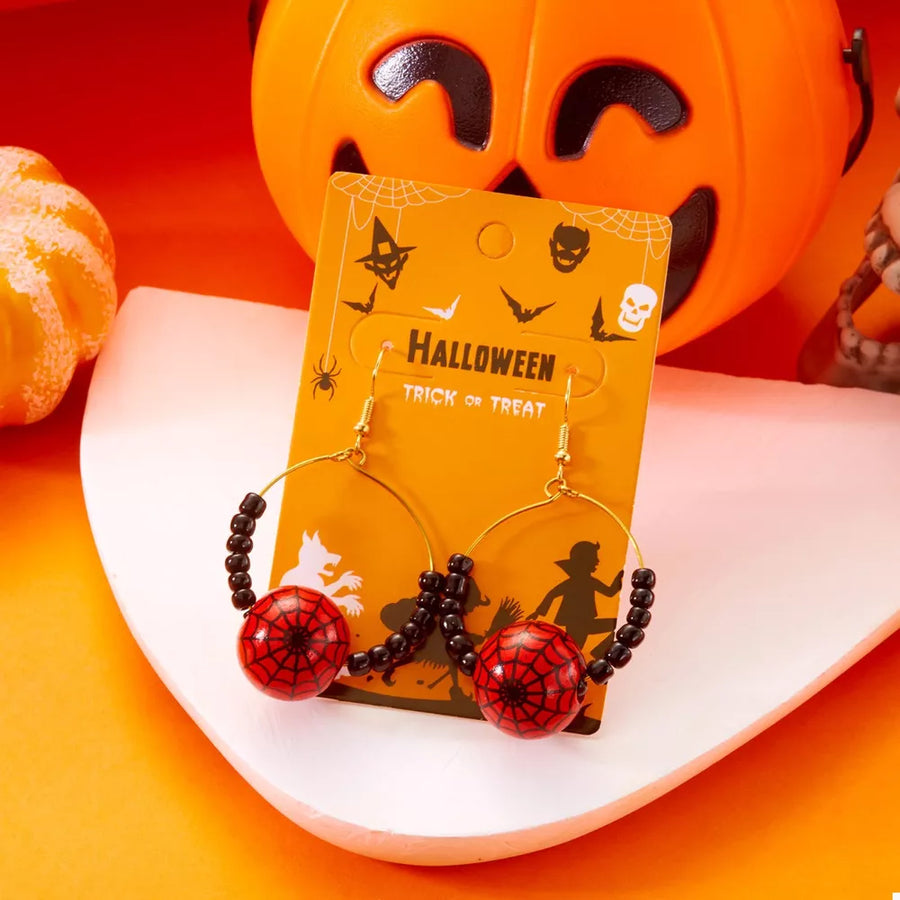 earrings in Orange with spiderweb and gold-plated