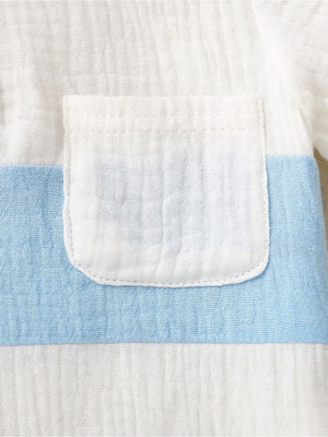Children's cotton color-block top with a white pocket and blue stripe detail.