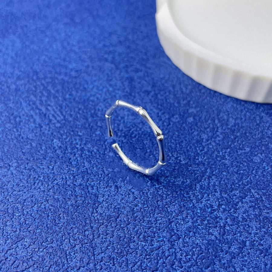 ring in Silver with branch motif and open design