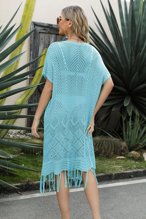 Light blue crochet cover-up dress with fringe hem and chevron pattern.
