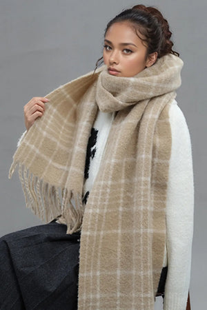 Tan plaid textured winter scarf with fringe detail.