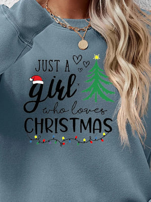 Misty Blue crewneck sweatshirt with Christmas graphic and lights.