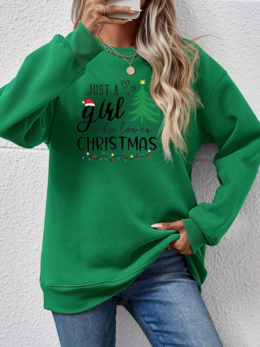 Green crewneck sweatshirt with Christmas graphic and string lights detail