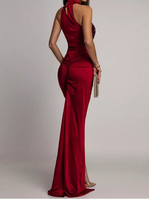 Burgundy formal gown featuring ruched and sequin