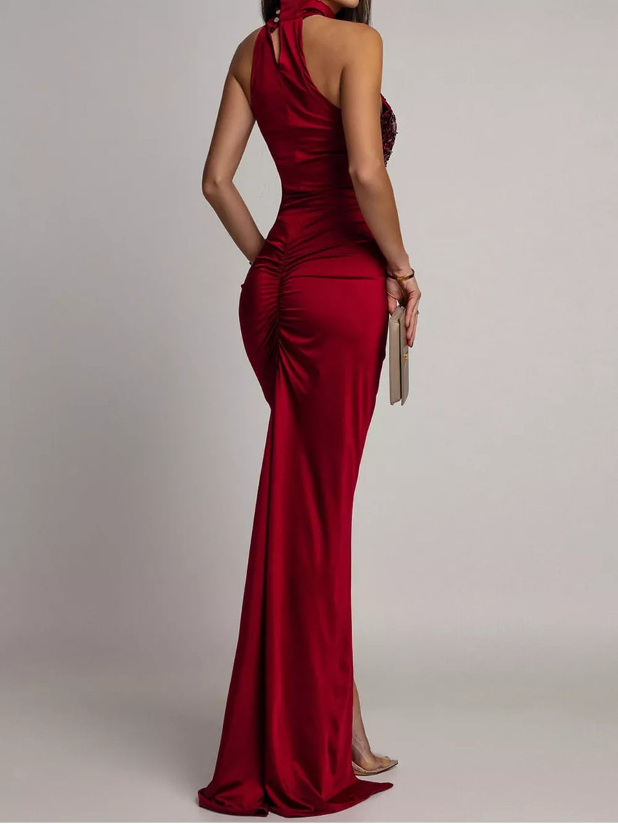 Burgundy formal gown featuring ruched and sequin