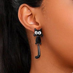 black earrings with novelty and na