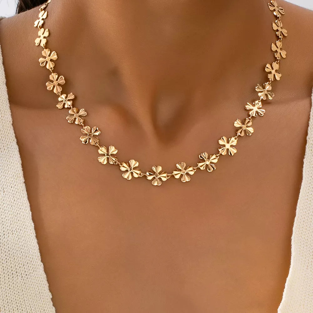 gold necklace with floral and not applicable
