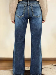 Dark blue denim straight leg jeans with vintage wash and buttoned closure.