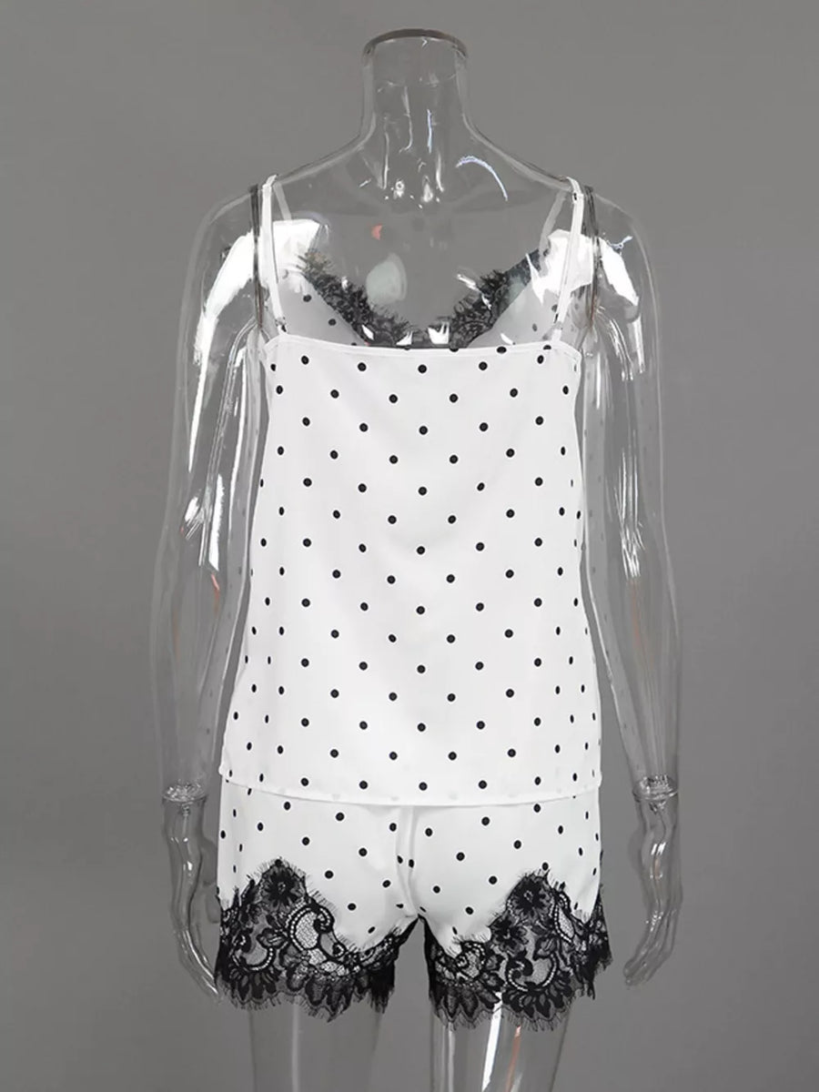 pajama set featuring polka dot in black with 100% polyester Care instructions: Machine wash cold texture