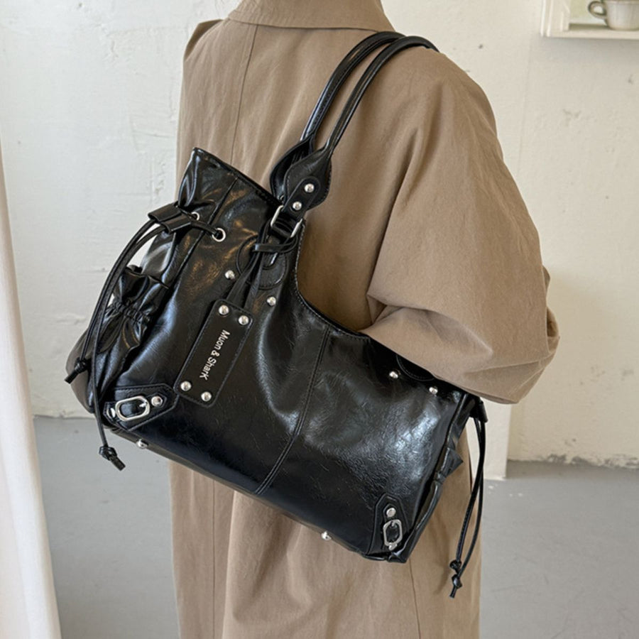 black with handbag with drawstring sides 9