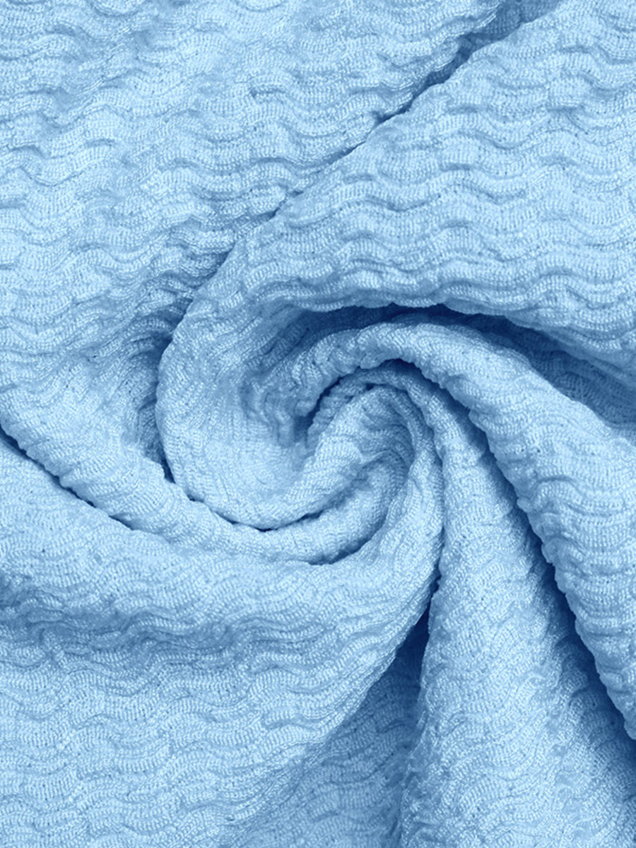 Smocked frill tube top in light blue textured fabric with buckle detail.