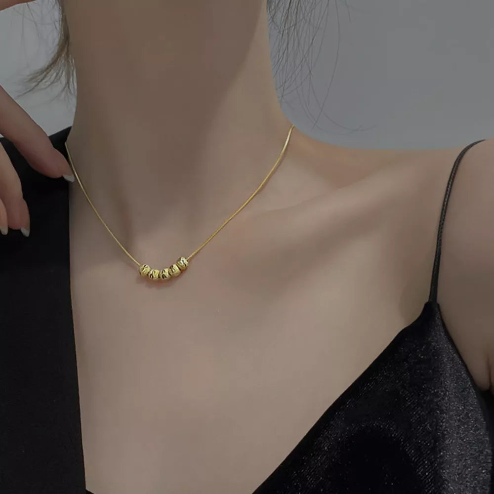necklace in gold featuring beaded and n/a fit