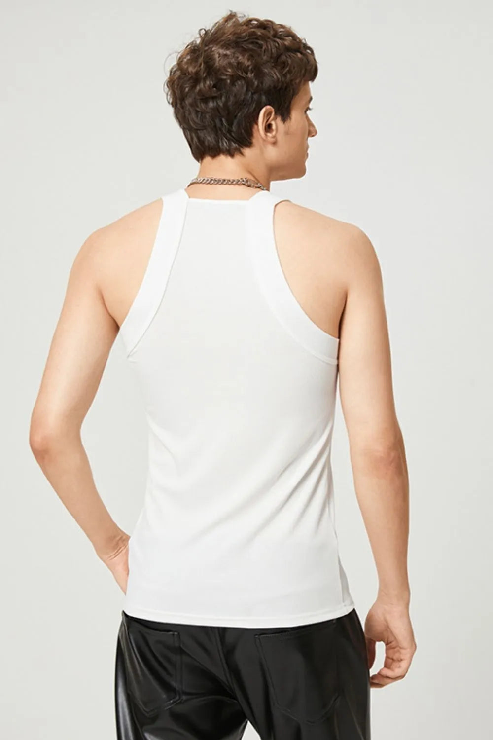 White ribbed tank top with square neckline and racerback detail.