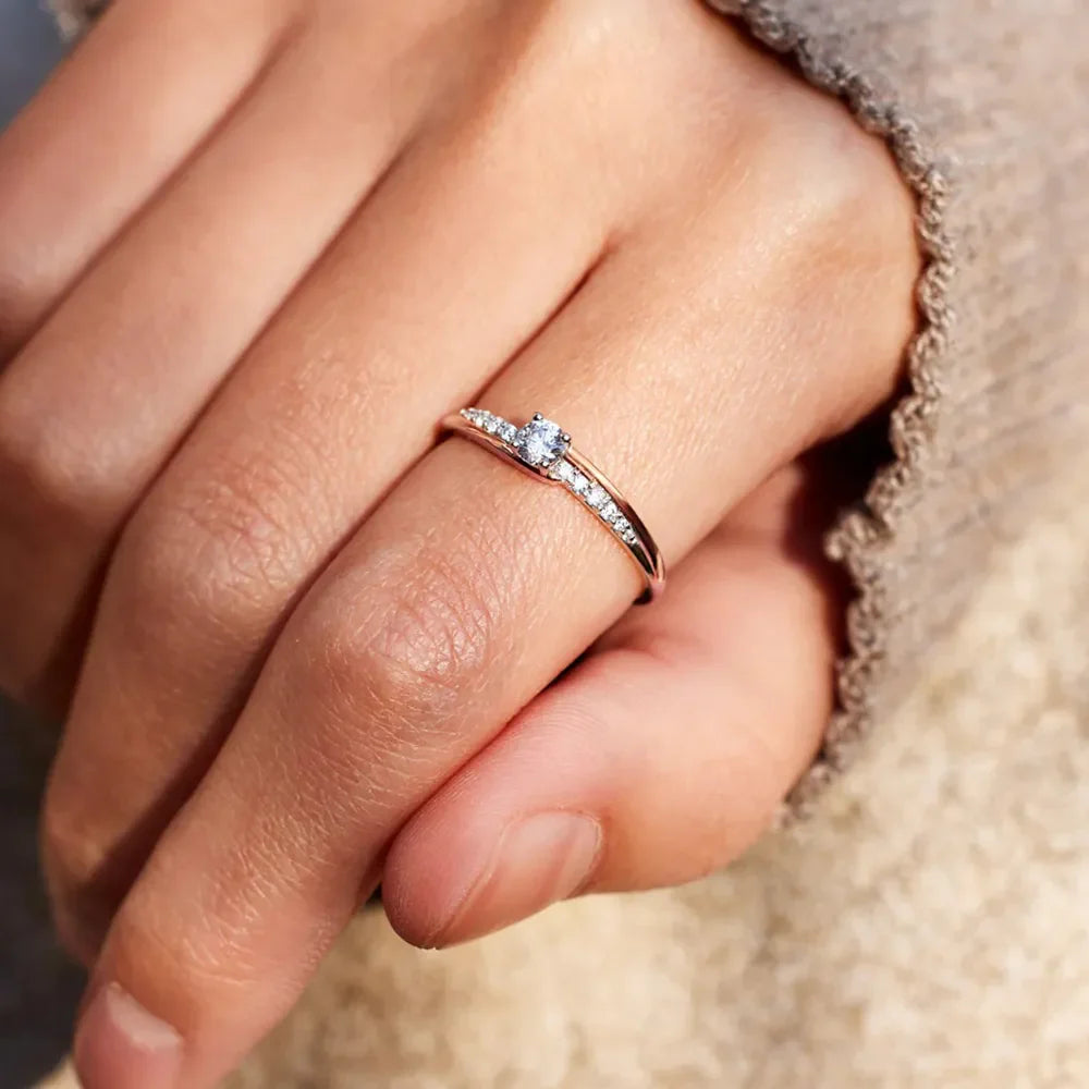 Dual band ring with diamond accents in silver.