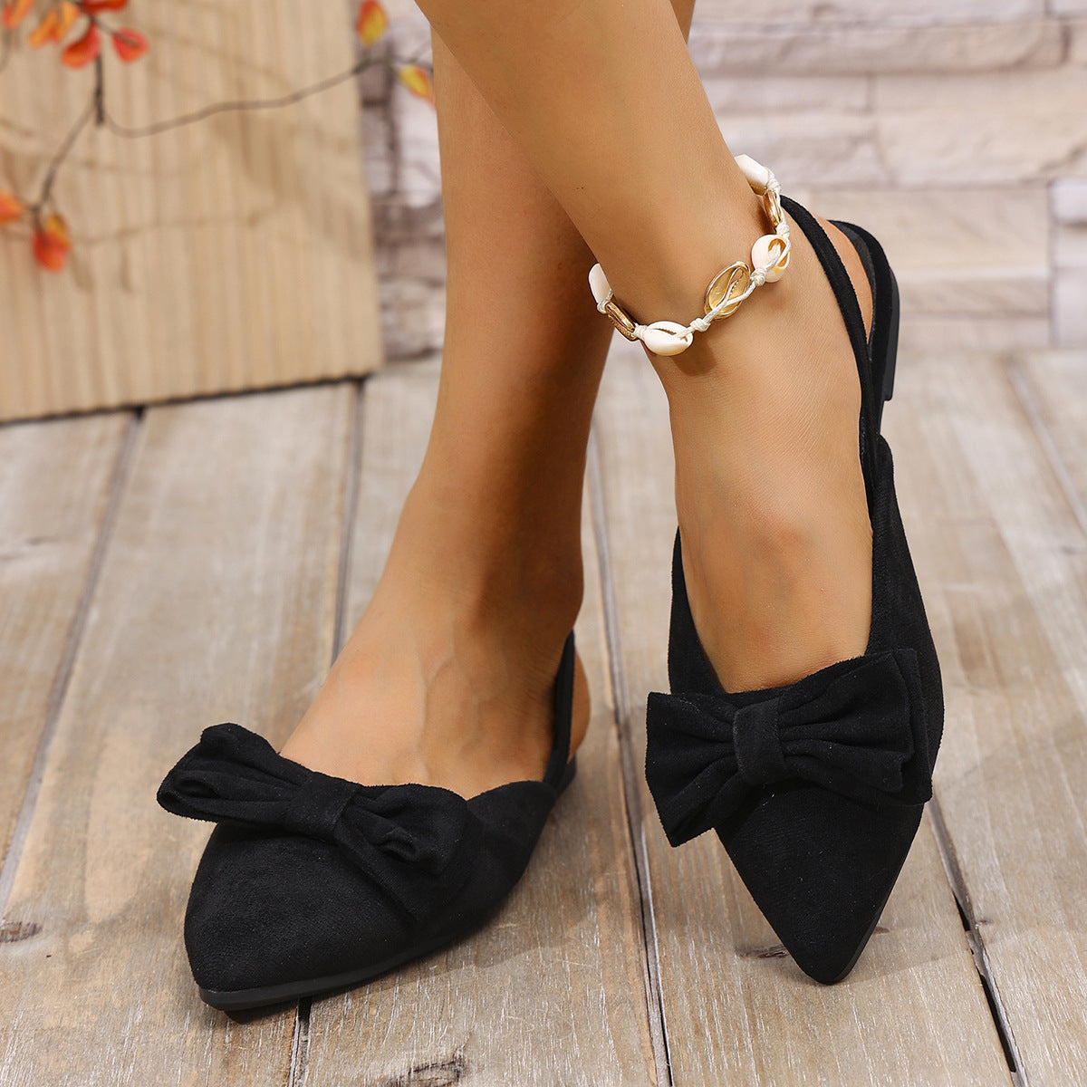 Black bow accent slingback slip-on flats with pointed toe