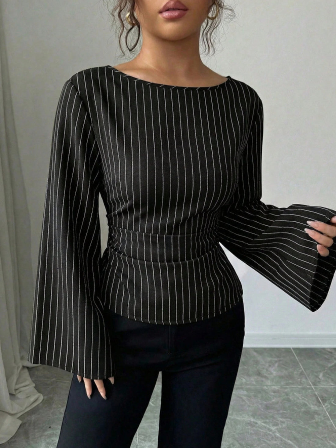 black blouse with striped and boat neck