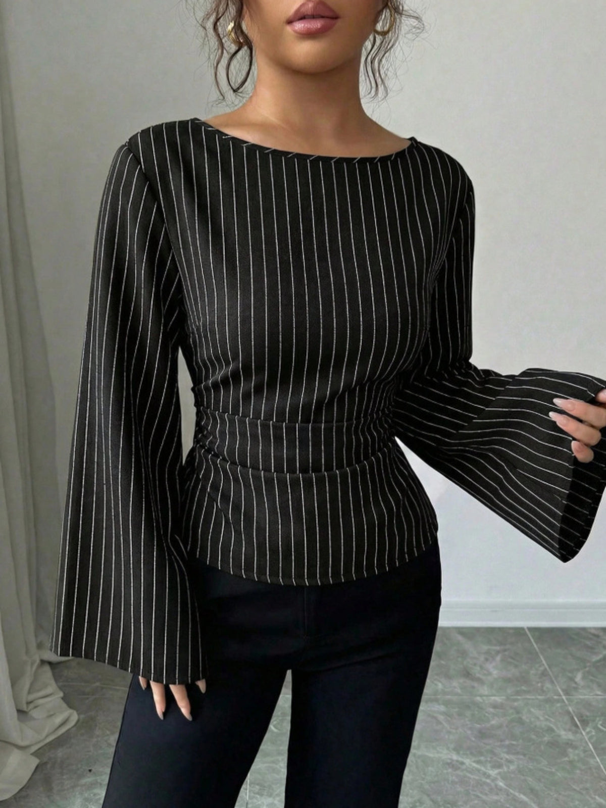 black blouse with striped and boat neck