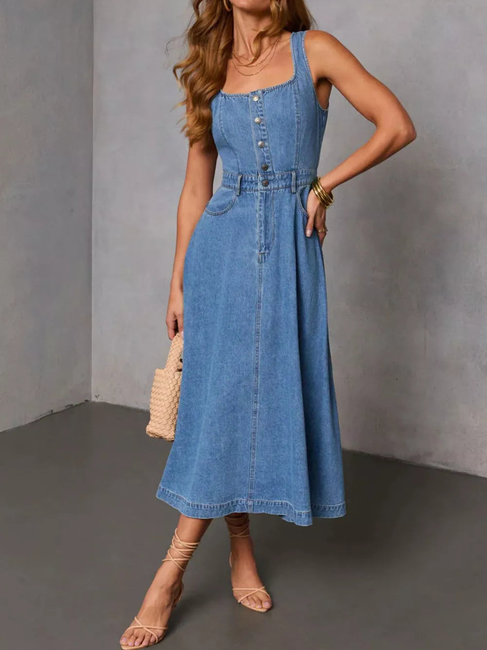 midi dress in light blue featuring buttoned and A-line fit