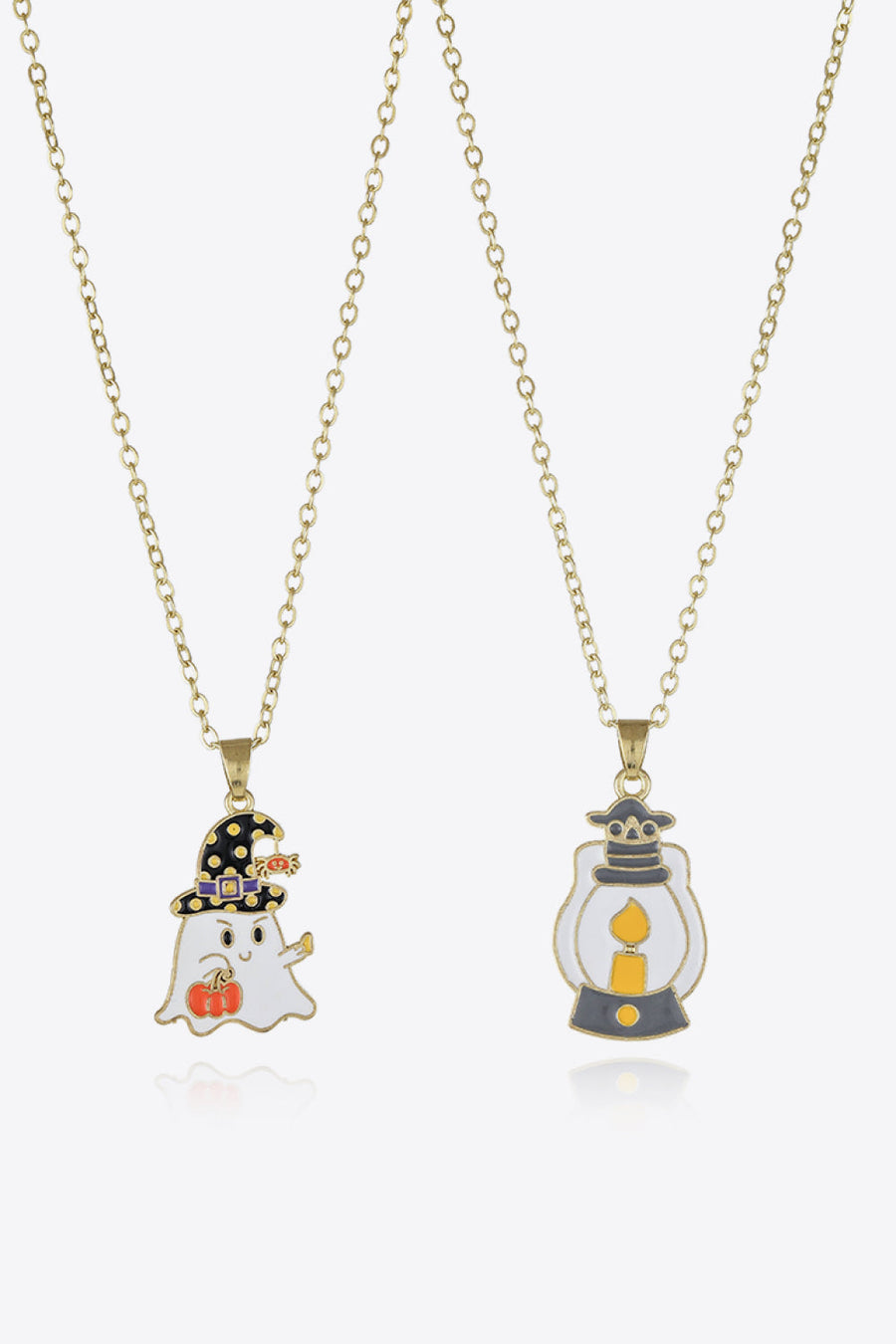 Spooky Season enamel pendant necklaces featuring a ghost with a witch hat and a lantern.