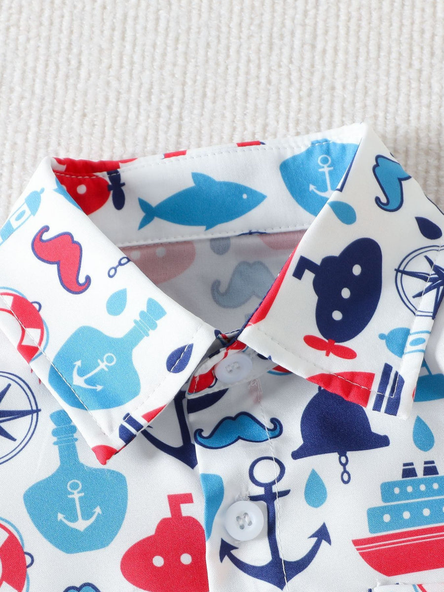 Toddler collared shirt with nautical print, featuring anchors, ships, and fish.