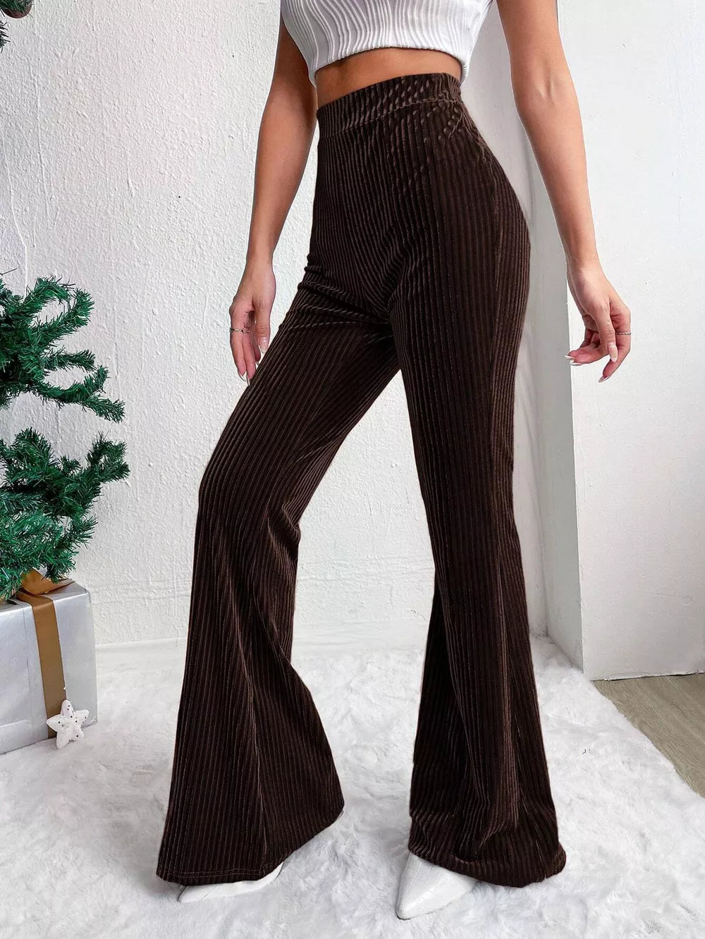 Dark Brown corduroy maternity flare pants with high waist and bell bottoms.