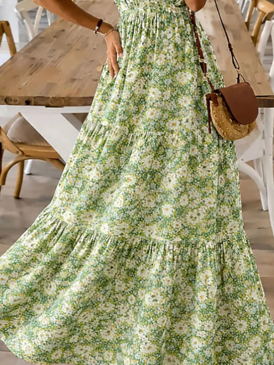 Floral tiered maxi dress in Yellow-Green with spaghetti straps and ruffled hem.