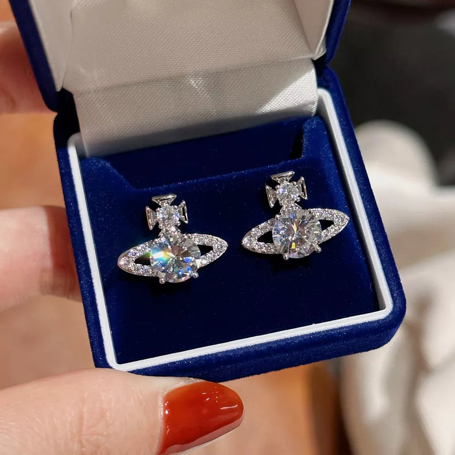 clear earrings featuring moissanite stones and motif