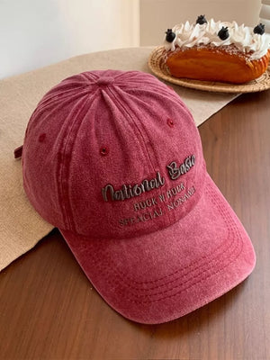 Wine red washed baseball cap with embroidered text detail
