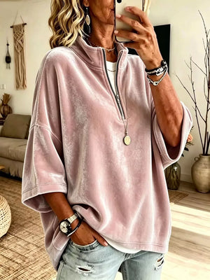 sweatshirt in blush pink featuring zipper and oversized fit