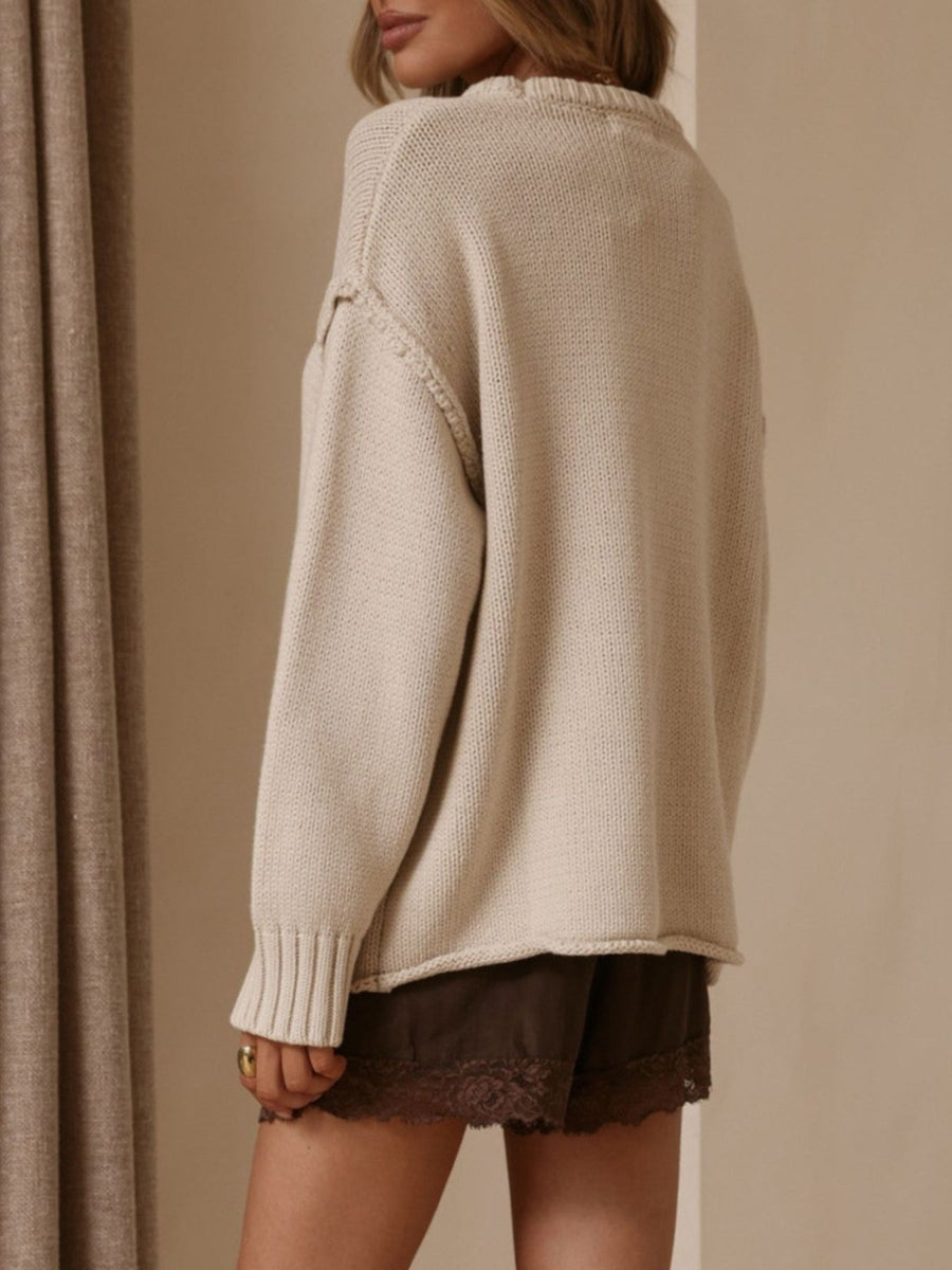 100% polyester Care instructions: Machine wash cold pullover sweater in Apricot Color with relaxed silhouette