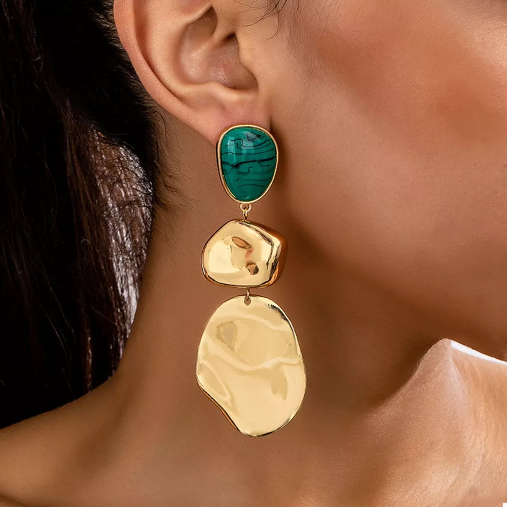 gold earrings with marbled and not applicable