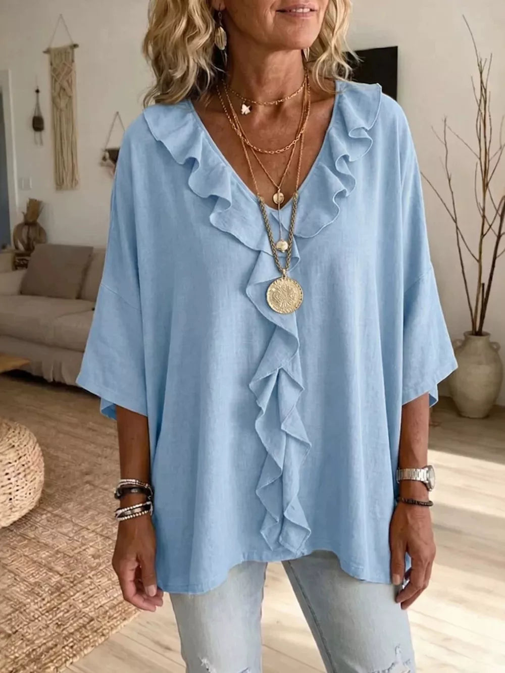 white blouse with seam detail and 3/4 sleeve