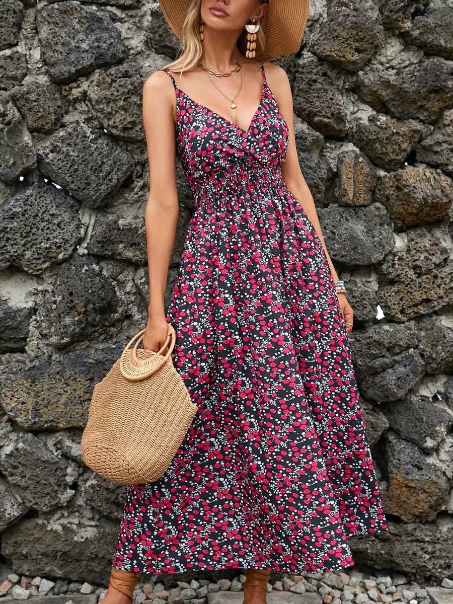 Maxi dress with a floral print, V-neck, spaghetti straps, and smocked waist.