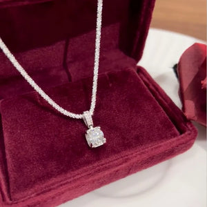 silver necklace with pendant and null