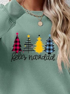 Feliz Navidad graphic crewneck sweatshirt in Sage green with Christmas tree designs and text.