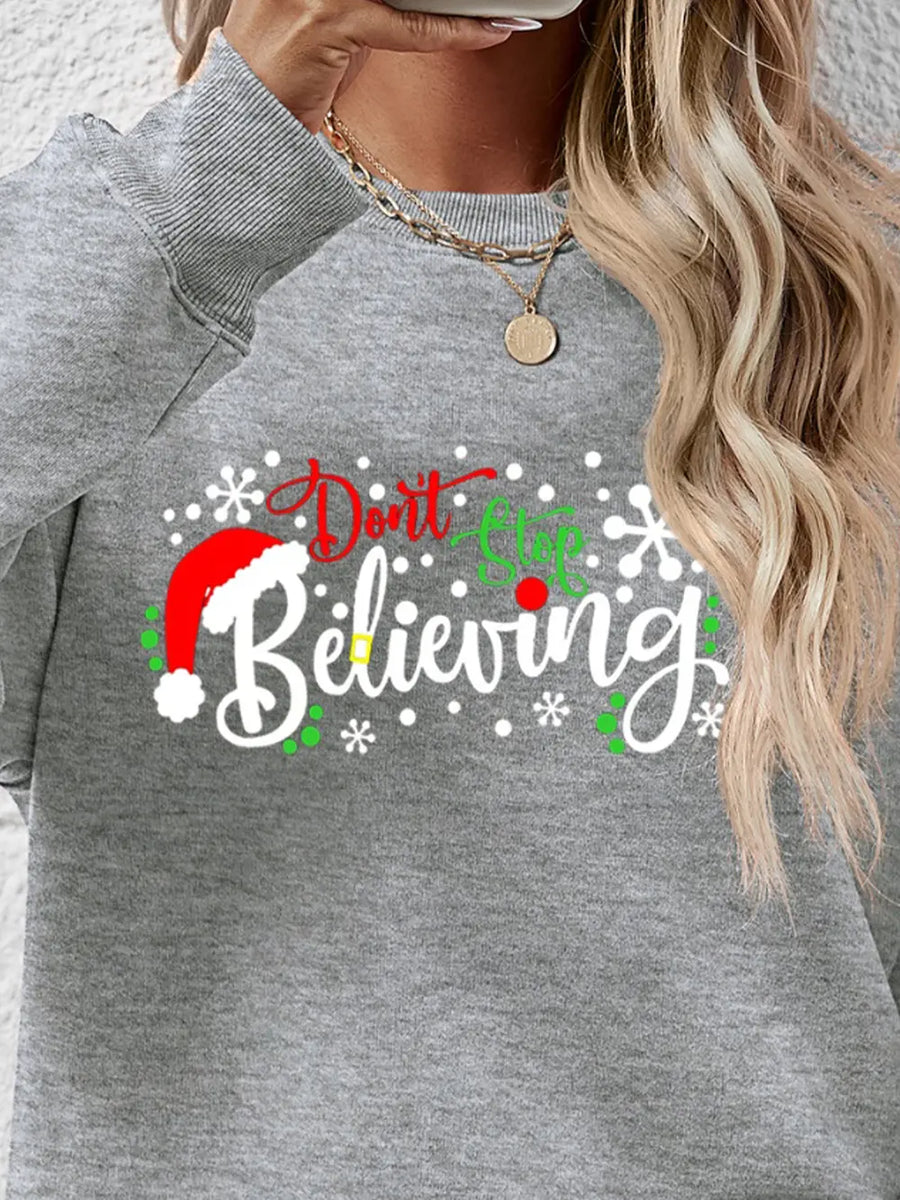 Graphi-Cool Long Sleeve Sweater in Charcoal with festive "Don't Stop Believing" graphic and Santa hat.