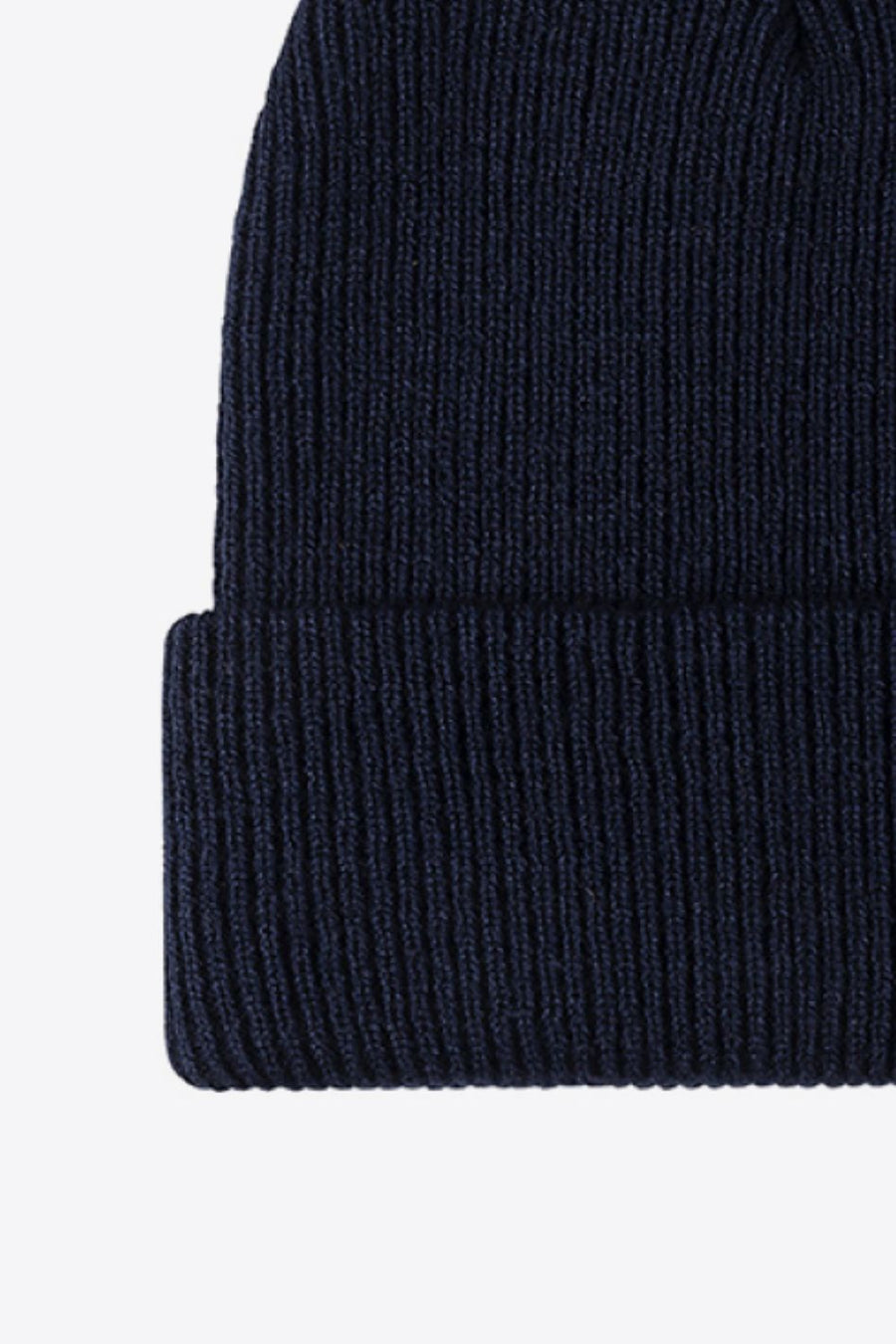 Navy ribbed knit beanie with a cuffed hem